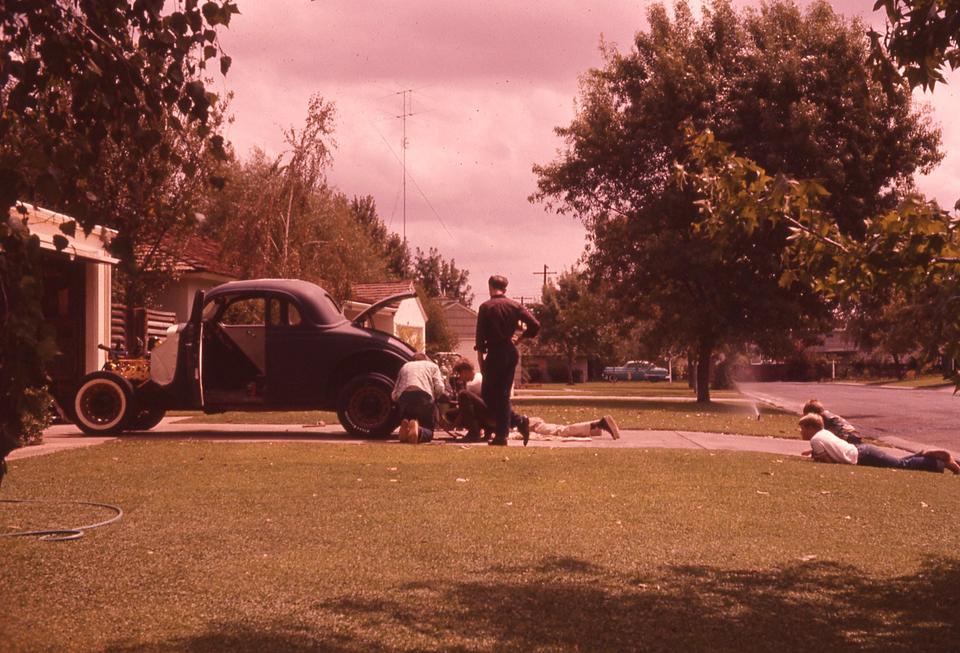 16-year-old David Wineland and Friends Fixing A Car