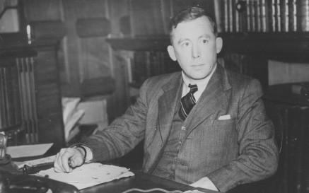 Richard Hayes sitting at his desk