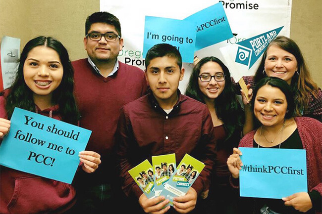 High school students holding PCC banners