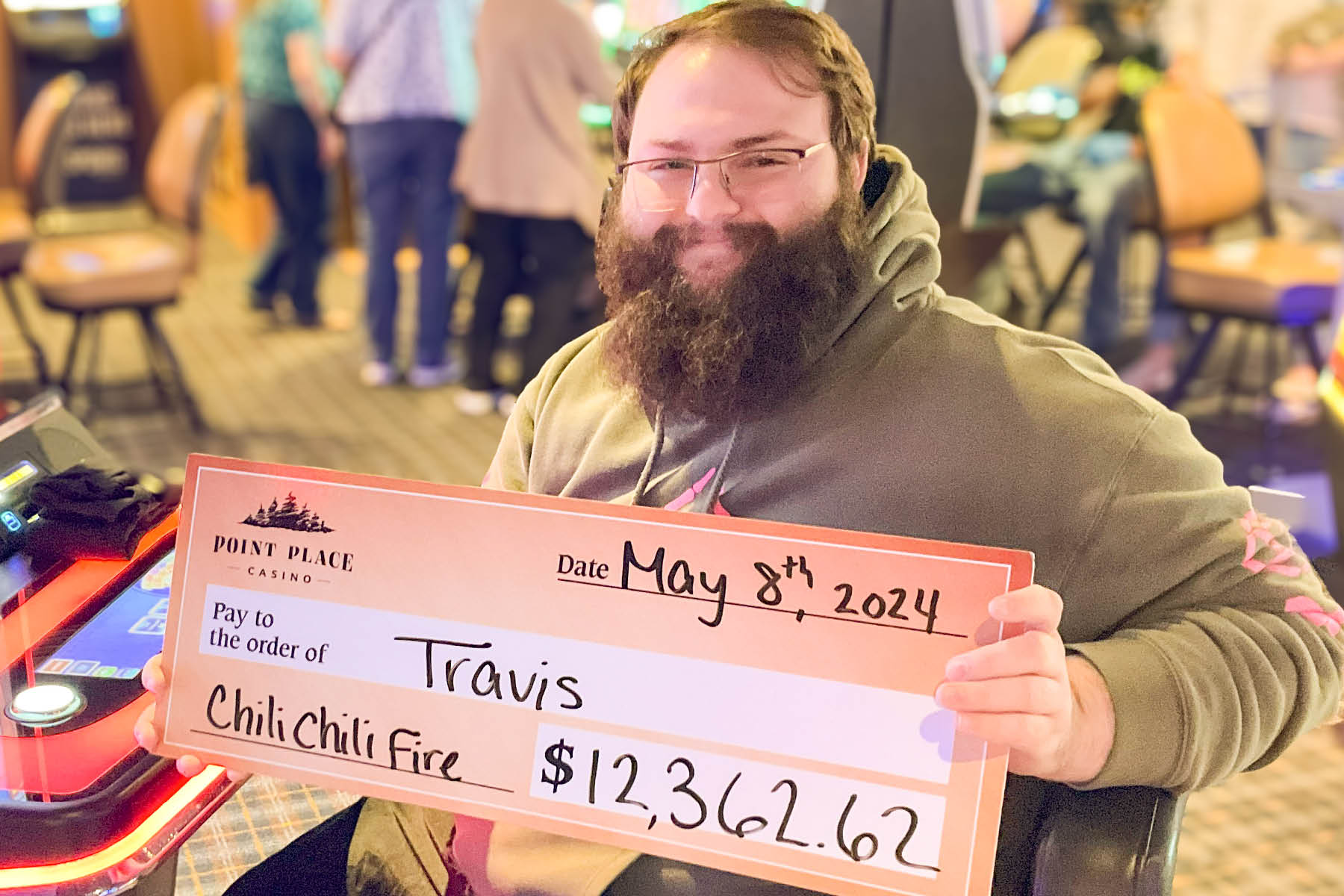 Travis won $12,362