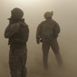 Dust surrounding a group of paratroopers