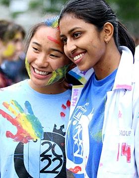 two students smiling