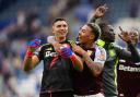 Aston Villa's Emiliano Martinez (left) and Aston Villa's Morgan Rogers (right) celebrates with the fans after the Premier League match at the King Power Stadium, Leicester. Picture date: Saturday August 31, 2024. PA Photo. See PA story SOCCER Leicester.