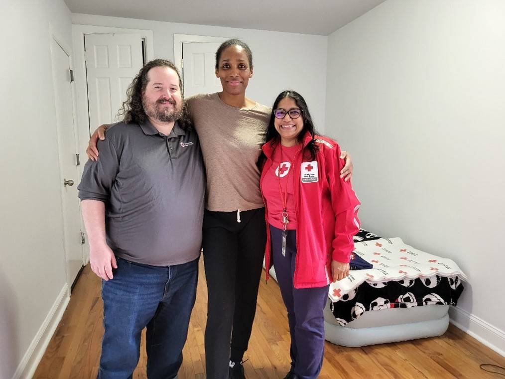 Red Cross SAF volunteers working with Martha to explore permanent housing options