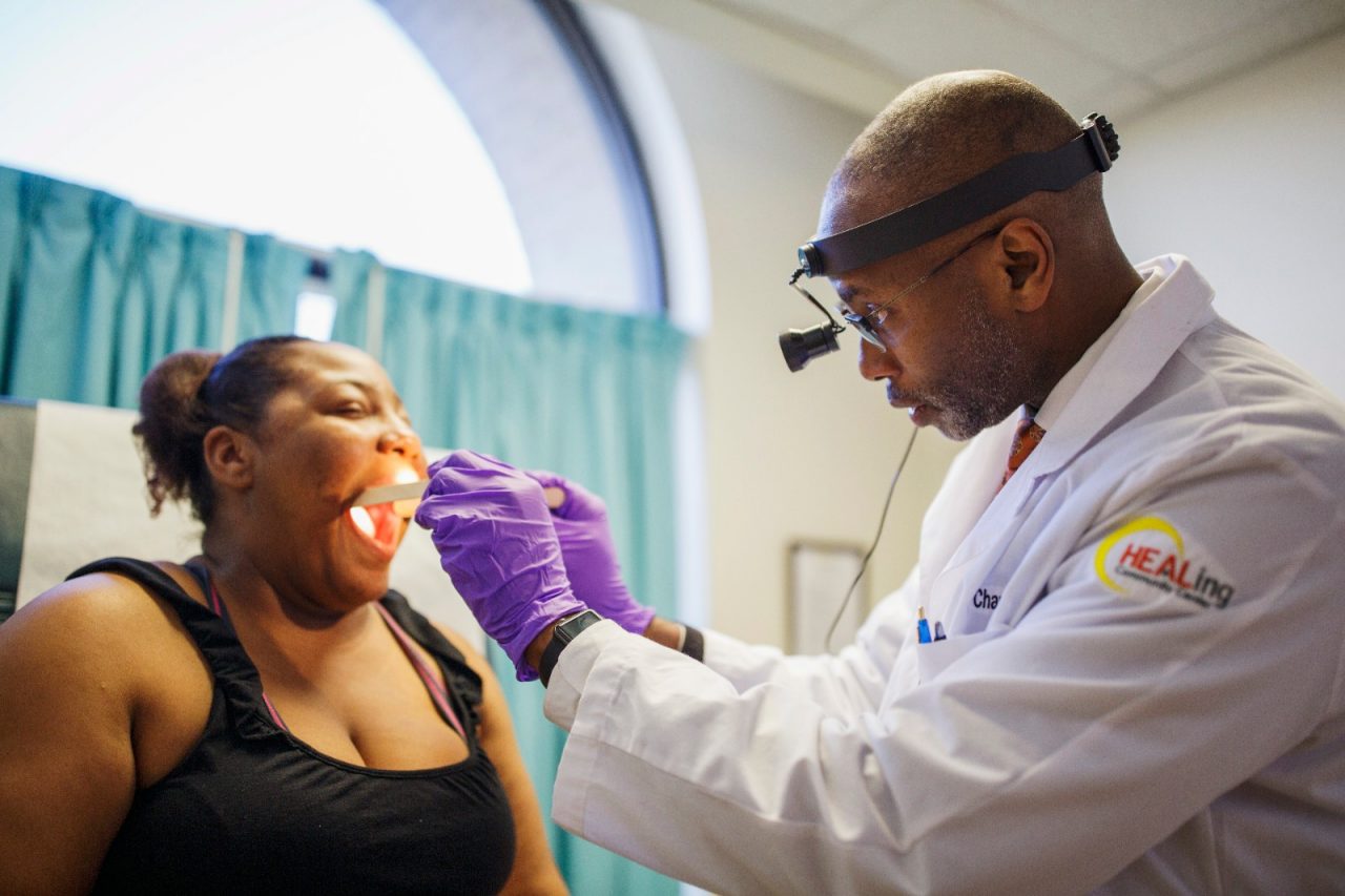 A doctor examining a patient.