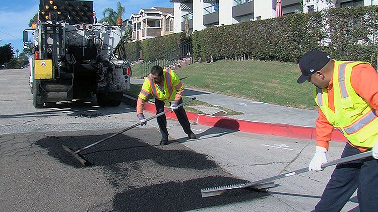 Street Division crew repairing pot holes