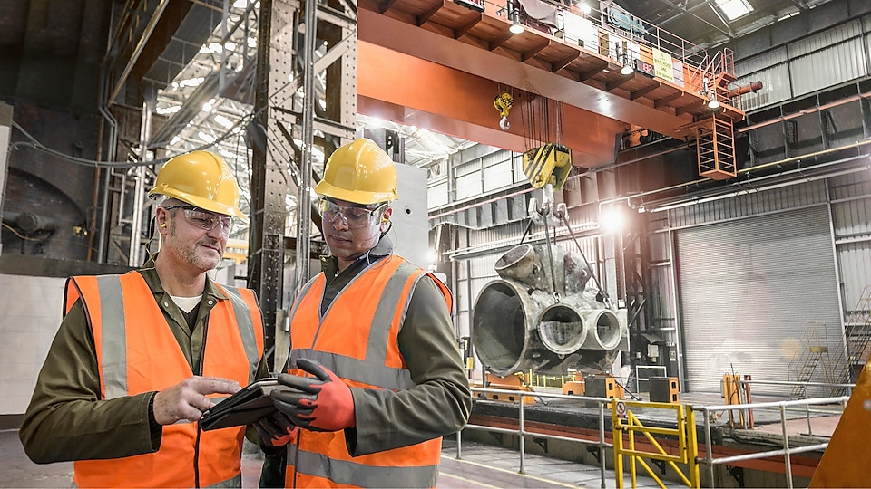 Two industry workers on site