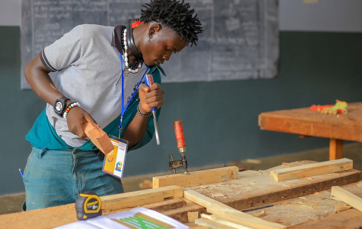 Carpenter working with wood.