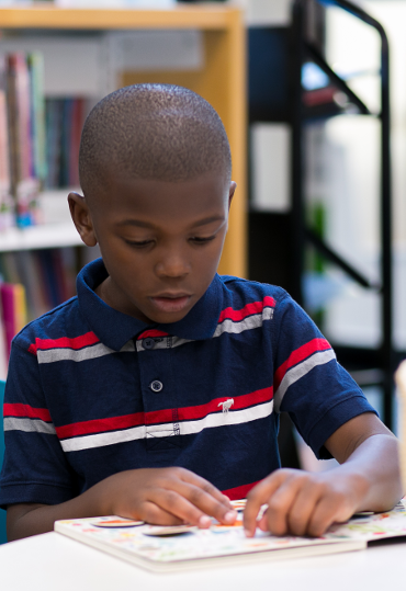 boy reading a book