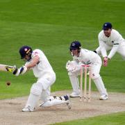 Glamorgan's Kiran Carlson hits out during day one of the Vitality County Championship