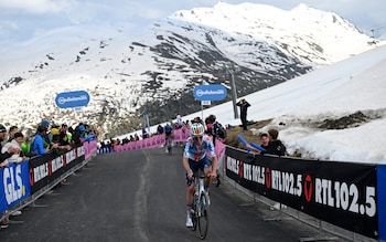 Team DSM's French rider Romain Bardet climbs the last kilometre of the 15th stage of the 107th Giro d'Italia cycling race on May 19