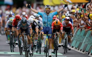 Mark Cavendish celebrates winning stage five