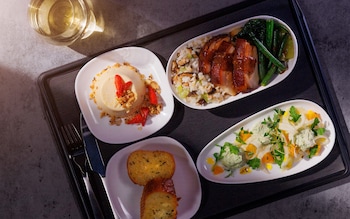 Glass of champagne on Air New Zealand flight