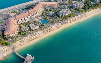 Aerial view of Sofitel Dubai surrounded by sea