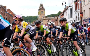 Cyclists in action at the start of stage one of the Lloyds Bank Women Tour of Britain 2024 from Welshpool to Llandudno