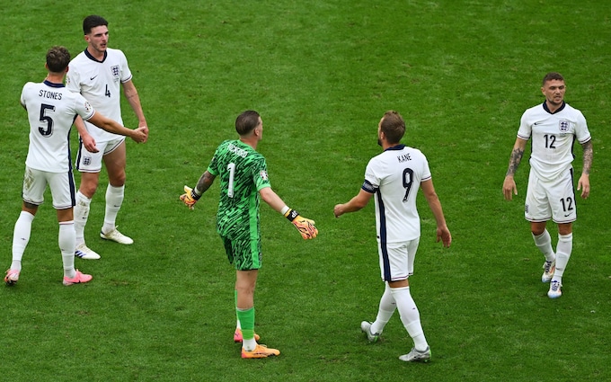 John Stones, Declan Rice, Jordan Pickford, Harry Kane and Kieran Trippier of England looks dejected after Slovakia take the lead