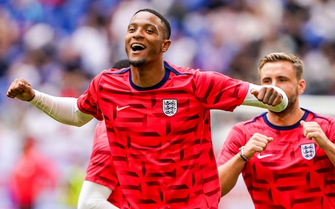 Ezri Konsa warms up before his tournament debut against Slovakia