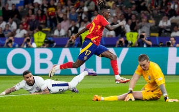 Spain's Nico Williams scores in the Euro 2024 final, much to the frustration of England pair Kyle Walker and Jordan Pickford