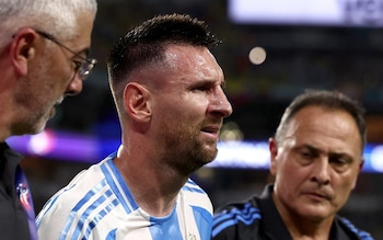 Argentina's Lionel Messi looks dejected after being substituted due to an injury