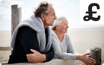 Couple in their 60s enjoying life on the beach