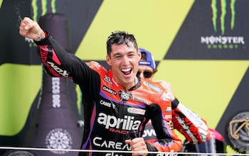 Aleix Espargaro, Aprilia Racing, celebrates on the podium after winning the British Grand Prix at Silverstone - Espargaro wins British Grand Prix