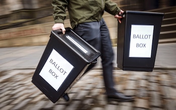 Ballot boxes being carried