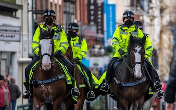 LIVERPOOL, ENGLAND - NOVEMBER 14: Paul Boys is detained and arrested by Police officers during an anti lockdown protest on November 14, 2020 in Liverpool, England. Throughout the Covid-19 pandemic, there have been recurring protests across England against lockdown restrictions and other rules meant to curb the spread of the virus. Police in Liverpool have warned protesters that they will take action against protesters, who could face possible fines. (Photo by Anthony Devlin/Getty Images)