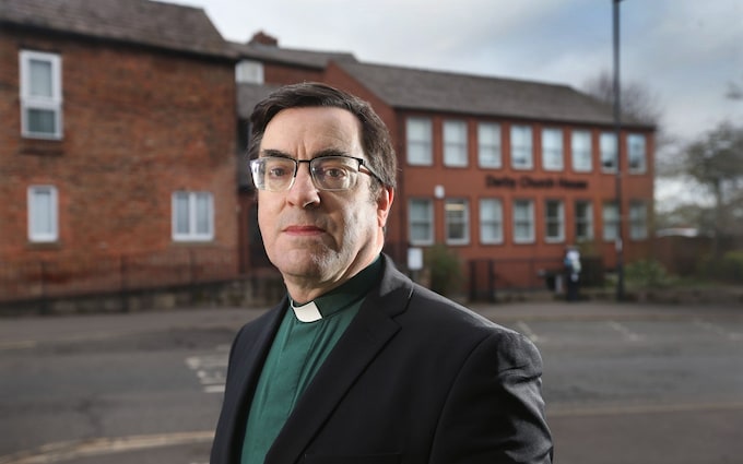 Dr Bernard Randall pictured in the centre of Derby in Derbyshire