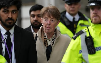 Ms Vennells arriving at the inquiry, flanked by police officers