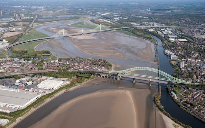 The Manchester Ship Canal, running alongside the wider River Mersey at Runcorn