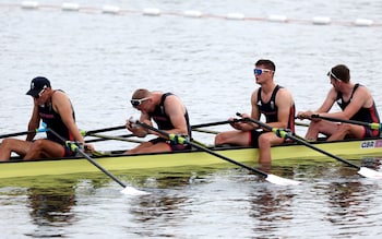 Graeme Thomas (far left) and his team-mates react to coming fourth in the quadruple sculls final