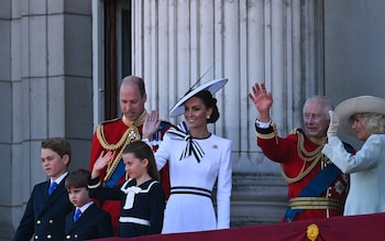 Royal family wave from the balcony of Buckingham Palace after attending the King's Birthday Parade