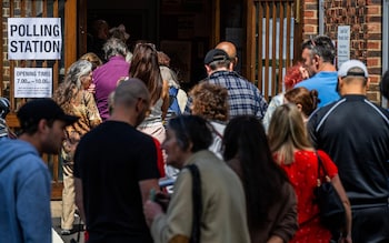 Voters arriving to cast their ballot in Hampstead and Highgate, north London