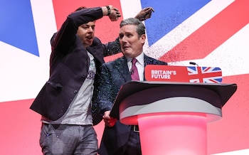 Keir Starmer was targeted by a protester who showered him with glitter as he spoke at the  Labour Party conference in October 2023