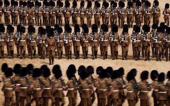 Troops of the Household Division take part in the Brigade Major's Review, the final rehearsal of Trooping the Colour, on Thursday