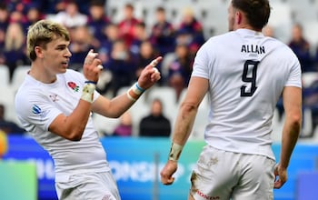 England's Ollie Allan celebrates scoring a try