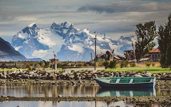 Coastal town of Puerto Natles & Cordillera mountains