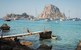 Cala d’Hort and Es Vedrá, a limestone monolith just offshore, looks spectacular silhouetted at sunse