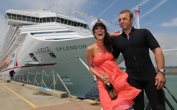 Myleene Klass poses with Royal Navy Diver Chris Rumming as Klass officially names and Launches 'Carnival Splendor' Cruise Ship