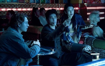 Ansel Elgort (left) as Adelstein in Tokyo Vice