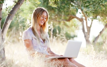 A woman using her laptop