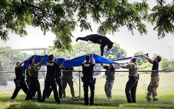 The bear was given two tranquilliser shots before being moved to an animal trap 