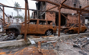 HOSTOMEL, UKRAINE - MARCH 17: Residential houses and cars burned during the 2022 Russian occupation of the settlements in Kyiv Oblast remain in Malovnychyi lane on March 17, 2024 in Hostomel, Ukraine. On 24 February 2022, Russia invaded Ukraine in an escalation of the Russian-Ukrainian War that started in 2014. The full-scale invasion is the largest military attack in Europe since World War II. (Photo by Kateryna Mykhailova/Global Images Ukraine via Getty Images)