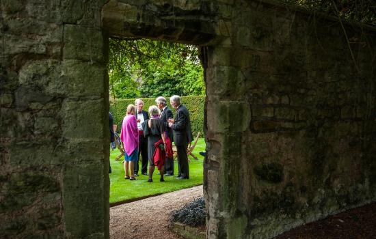 Group of people standing in President's garden