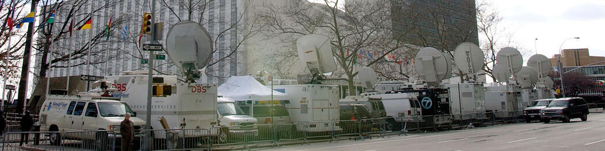 A view of the United Nations campus and media satellite dishes outside Headquarters. UN Photo/Eskinder Debebe