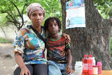 Carole Lafon and her twins were forced out of their home by violence in Port-au-Prince, Haiti. 