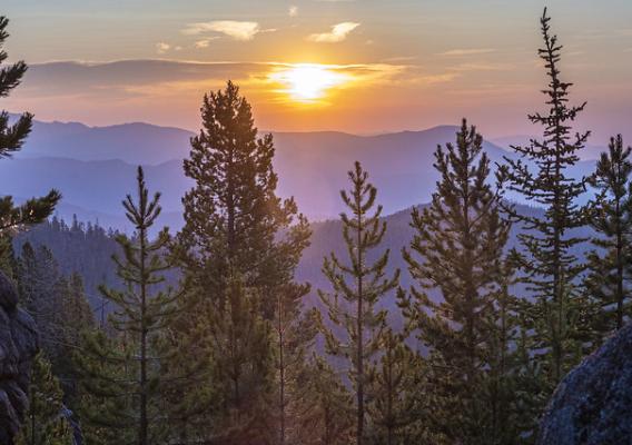 The sunrise over the Whitetail Mountains from the East Ridge near Butte, Montana