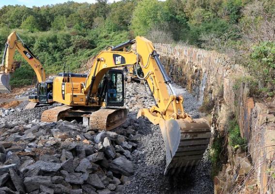 Construction crews working on a dam