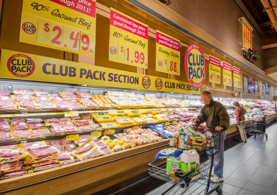 Shoppers at the meat poultry department of a grocery store