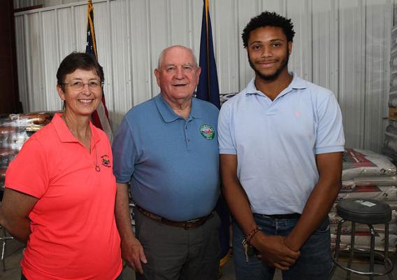 Brenda Schnell, Alliance NRCS Field Office secretary, U.S. Agriculture Secretary Sonny Perdue, and USDA Pathways intern, Luther Thompson II